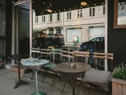 Tables out front by the window